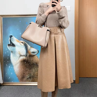 1363 nouvelle mode ceinture flocon de neige en peau de mouton grande balançoire Midi jupe taille haute en cuir véritable parapluie jupe