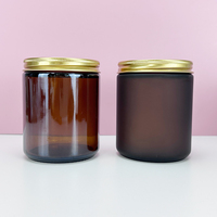 Approvisionnement d'usine 30ml 50ml 100ml 150ml 250ml 500ml Pot de bougie en verre rond ambré avec couvercle en or noir