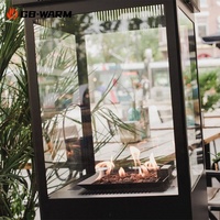 Cheminée de terrasse à gaz populaire avec flamme en verre pour jardin, restaurant et patio extérieur