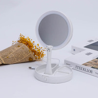 Miroir de maquillage pliable en gros avec éclairage LED, miroir de vanité à écran tactile intelligent, miroir cosmétique rond pour coiffeuse