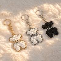Breloque de sac en métal motif dessin animé pour femme, pendentif mignon inspiré d'Instagram, accessoires de mode pour clés de voiture, cadeau souvenir