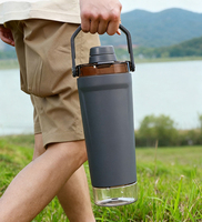 Bouteille d'eau isotherme en acier inoxydable personnalisée de 20 oz, avec poignée portable pour le sport, la salle de sport, les boissons froides et chaudes