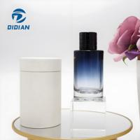 Flacon de parfum en verre cylindrique rond de luxe personnalisé avec impression couleur 30 ml 50 ml 100 ml avec pompe pulvérisateur et boîte