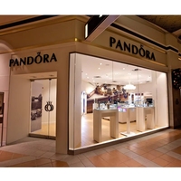 Vitrine de présentation de bijoux de luxe moderne avec éclairage LED pour colliers et boucles d'oreilles, idéale pour les boutiques