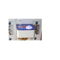 Machine à griffes interactive intelligente à deux joueurs Grue à affichage transparent Équipement d'arcade commercial d'intérieur