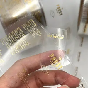 Fabbricazione di etichette adesive trasparenti personalizzate stampa logo adesivo in carta lamina d'oro adesivo in vinile per etichetta di imballaggio