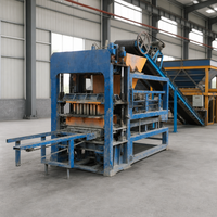 Machine de fabrication de blocs de béton entièrement automatique QT4-15 24KW pour la production de briques creuses et pleines pour le pavage en Afrique