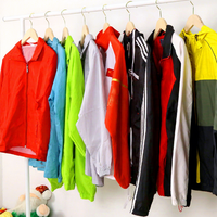 Pakaian Bekas Grosir Baju Olahraga Nylon Pria Wanita Tracksuit Bekas Jaket Windbreaker Celana Grosir Pakaian Bekas Bale untuk Dijual Kembali