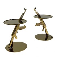Table d'appoint moderne de luxe en acier inoxydable avec un design simple et créatif de style AK47, un excellent choix pour une