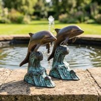 Paire de statues de dauphin en bronze vintage Offre Spéciale sautant de la vague