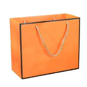 Garantili kalite özel baskı alışveriş pembe mavi yeşil mor sarı gri turuncu geri dönüşümlü kağıt kendi Logo ile turuncu çanta