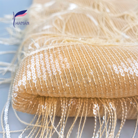 Tissu en maille 100 % polyester écologique de luxe avec broderie de sequins et design à franges pour robes de soirée et de mariage pour femmes et filles