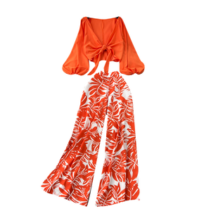 Ensemble deux pièces pour femme : haut à col en V et pantalon ample imprimé à jambes larges, style élégant et décontracté - Product Image 1