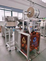 Machine d'emballage de haute précision à double disque vibrant pour le comptage et le conditionnement de vis, de quincaillerie, de granulés plastiques / Machine d'emballage en sacs
