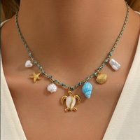 Collier en corde avec breloque coquillage et perle d'eau douce pour femme, en acier inoxydable plaqué or 18 carats PVD, style vacances océaniques, pour usage quotidien, été