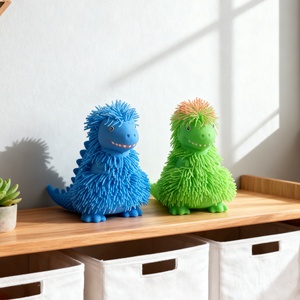 Nouveau jouet anti-stress transfrontalier en TPR, dinosaure de dessin animé à poils longs et paillettes, jouet créatif en caoutchouc souple pour jeunes (7-14 ans) - Product Image 1