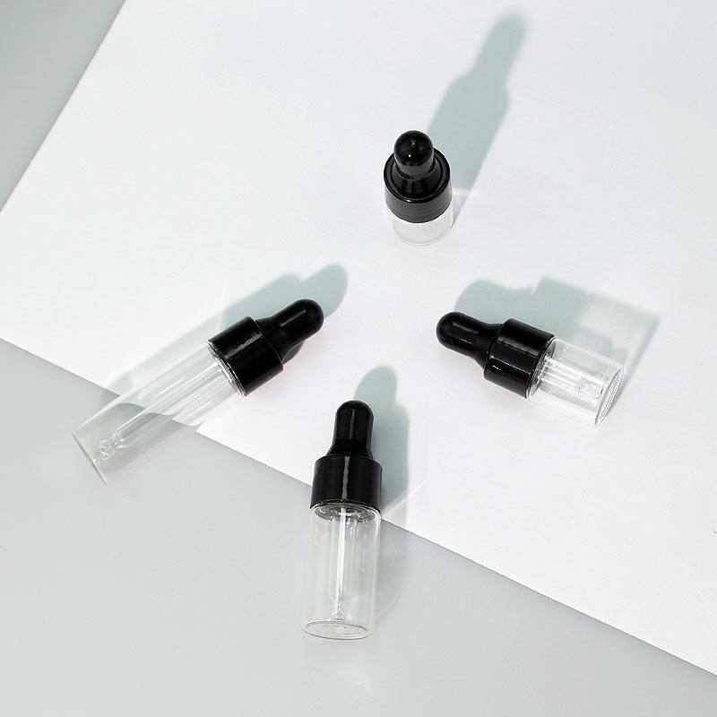 clear dropper bottle + black ring + black cap