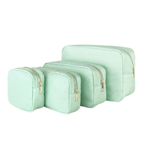 Sac de maquillage tendance pour femme, grande capacité, avec fermeture éclair en nylon multicolore et fermoir, 4 spécifications - Vente chaude