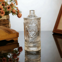 Nouvelle bouteille de vin en verre exquise avec motif de dragon en relief, bouteille à liqueur transparente épaissie vide pour whisky et spiritueux
