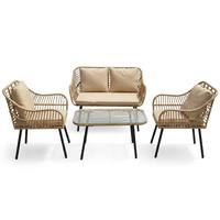 Ensemble de meubles de jardin en rotin tressé imperméable style bohème, avec coussins beige clair, 4 pièces, comprenant un fauteuil et une table basse en verre.