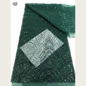 Nouveau tissu en dentelle de tulle jacquard extensible brodé avec sequins, tricoté en trame, en stock, pour robes de mariée et de demoiselles d'honneur - Product Image 1