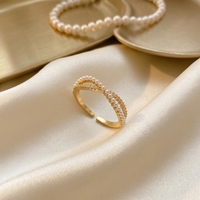 Bague tendance pour femme en laiton plaqué or 18 carats/or rose/rhodium, réglable, avec perle et nœud ajouré, pour le quotidien