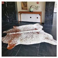 Dernières tapis de sol en peau de vache naturelle de conception blanche brune tapis de peau de vache véritable de luxe pour le s