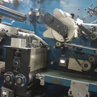 Machine de fabrication de couches pour bébés d'occasion machine à serviettes hygiéniques semi-automatique
