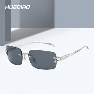XUEDIAO 2025 Trending Modern Metal Square Gafas <span class=keywords><strong>de</strong></span> <span class=keywords><strong>Sol</strong></span> <span class=keywords><strong>para</strong></span> hombres y mujeres <span class=keywords><strong>de</strong></span> lujo UV400 Gafas sin montura con logotipo personalizado - Product Image 1