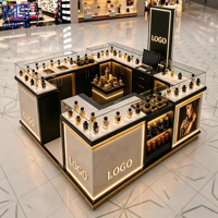 Comptoir de présentation de parfums rond, îlot ovale avec éclairage LED, finition en acier inoxydable doré, pour magasin de détail, centre commercial, kiosque, taille personnalisée
