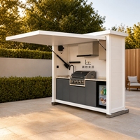Cuisine extérieure sur mesure en acier inoxydable avec barbecue, évier et Kamado