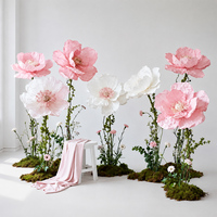 Reuze handgemaakte papieren bloemen bruiloftdecoratie kunstbloemen tuinachtergrond evenement feest presentatie op maat gemaakte bloemendecoratie