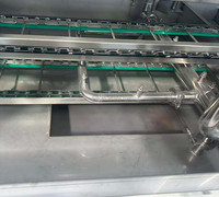 Laveuse industrielle automatique de caisses et de bacs en plastique de type tunnel, machine de lavage haute pression en SUS304 pour usine alimentaire