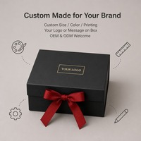 Boîte cadeau magnétique à rabat noir mat personnalisée avec nœud en ruban rouge, pliable, vente en gros, directement de l'usine pour la vente au détail