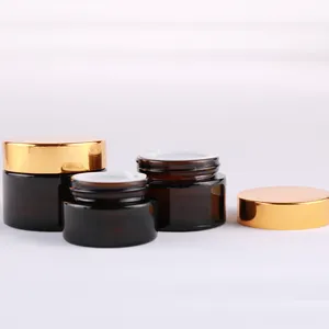 Trung Bình Sang Trọng 2Oz Glass Jar 15Ml 30Ml 50Ml 60Ml 125Ml Nâu Glass Chum Hổ Phách Chai Kem Với Vàng Nắp