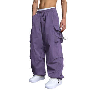 กางเกงคาร์โก้ขนาดใหญ่สำหรับผู้ชายสไตล์ฮิปฮอปสตรีทแวร์ – กางเกงยุทธวิธีทรงหลวมเอวยางยืดพร้อมเชือกผูก มีกระเป๋าหลายช่อง เหมาะสำหรับใส่ลำลอง - Product Image 1