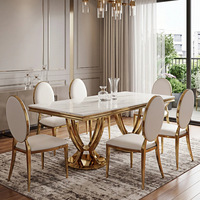 Table à manger en marbre de luxe léger, fabrication directe d'usine de Foshan, structure en acier plaqué or, design rectangulaire, usage domestique, 4 places