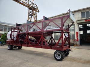 Línea de producción de planta dosificadora de hormigón eléctrico móvil con Tres tambores de almacén JZM750 con control PLC - Product Image 2