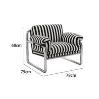 Fauteuil individuel en velours, durable, avec structure métallique et rembourrage en mousse, idéal pour hôtels et salons, design minimaliste.