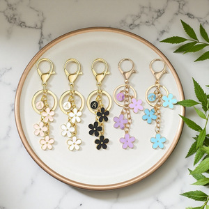 Cute Initial Letter and White Pink Flower Keychain Fashionable Alloy <strong>Keyring</strong> <strong>Charm</strong> for Handbag Backpack Pendant Wholesale - Product Image 1