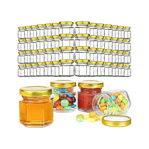 Venta al por mayor de contenedores de vidrio hexagonales botella de almacenamiento con tapa de metal botella de almacenamiento de alimentos tarro de miel de vidrio