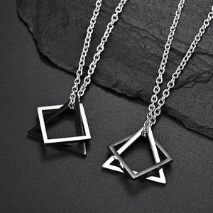 This minimalist, unisex <b>titanium</b> steel necklace features a unique design with stacked triangular and square geometric patterns, - Product Image 4