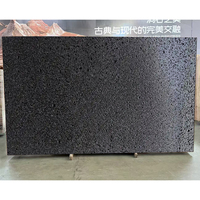 Carreaux de revêtement de mur intérieur extérieur en pierre de travertin noir de luxe naturel pour la décoration d'hôtel