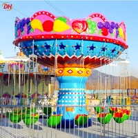 Manège à bascule en forme de pastèque pour installation en extérieur dans les parcs, pour un divertissement familial attrayant et des attractions de fête foraine