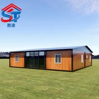 Maison familiale à trois modules, conteneur préfabriqué pliable de 20 pieds, bungalow en bois grainé, isolé en acier, deux chambres, personnalisable OEM ODM