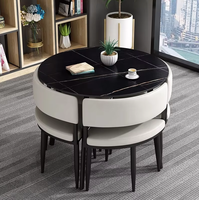 Ensemble de salle à manger GEDO de luxe léger personnalisé en cuir PU, table ronde en pierre avec 4 chaises