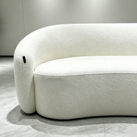 Canapé inclinable trois places nordique rembourré avec rembourrage en éponge, design incurvé pour salons d'appartements et de villas