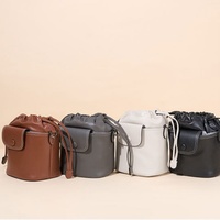 Nouveau sac hobo en cuir véritable, style sac seau à cordon, sac à bandoulière polyvalent pour femmes, pour un usage quotidien