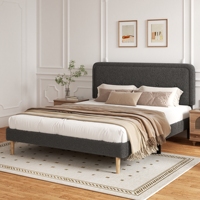 Lit plateforme tendance en tissu bouclé avec tête de lit rembourrée et pieds en bois fins pour une vie contemporaine à la maison