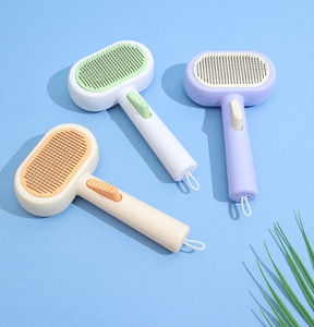 Spazzola autopulente 2 in 1 per animali domestici OEM ODM all'ingrosso, <span class=keywords><strong>pettine</strong></span> per toelettatura cani e gatti con rimozione peli e pulsante di rilascio - Product Image 4